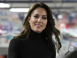 Britain's Kate, Princess of Wales smiles during her visit to Sebby's Corner in north London, Friday, Nov. 24, 2023. (AP Photo/Frank Augstein, Pool, File )