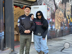AP Photo/Leslie Ambriz Superchief Art Gallery director Bill Dunleavy and creative director Celina Rodriguez transformed their art gallery into a donation center for those affected by the California wildfires.