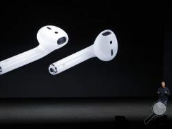Phil Schiller, Apple's senior vice president of worldwide marketing, talks about the features on the new iPhone 7 earphone options during an event to announce new products, Wednesday, Sept. 7, 2016, in San Francisco. (AP Photo/Marcio Jose Sanchez)
