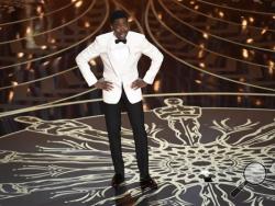 Host Chris Rock speaks at the Oscars on Sunday, Feb. 28, 2016, at the Dolby Theatre in Los Angeles. (Photo by Chris Pizzello/Invision/AP)