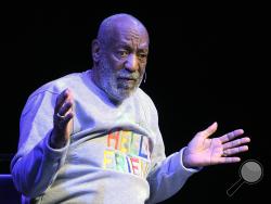 Comedian Bill Cosby performs at the Maxwell C. King Center for the Performing Arts, in Melbourne, Fla., Friday, Nov. 21, 2014. (AP Photo/Phelan M. Ebenhack)