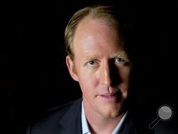 Retired Navy SEAL Robert O'Neill, 38, who says he shot and killed Osama bin Laden, poses for a portrait in Washington, Friday, Nov. 14, 2014. The former Navy SEAL says he was inspired to go public about his role after meeting with the families of people who died in the attacks of Sept. 11, 2001. (AP Photo/Jacquelyn Martin)
