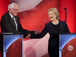 Democratic presidential candidate, Sen. Bernie Sanders, I-Vt, and Democratic presidential candidate, Hillary Clinton shake hands during a Democratic presidential primary debate hosted by MSNBC at the University of New Hampshire Thursday, Feb. 4, 2016, in Durham, N.H. (AP Photo/David Goldman)