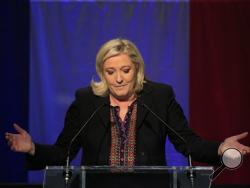 Far Right National Front party leader Marine Le Pen delivers her speech after the results of the second round of the regional elections in Henin-Beaumont, northern France, Sunday Dec.13, 2015. Marine Le Pen's far-right National Front collapsed in French regional elections Sunday after dominating the first round of voting, according to pollsters' projections. (AP Photo/Thibault Camus)