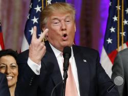 Republican presidential candidate Donald Trump speaks to supporters at his primary election night event at his Mar-a-Lago Club in Palm Beach, Fla., Tuesday, March 15, 2016. (AP Photo/Gerald Herbert)