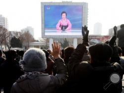 North Koreans watch a news broadcast on a video screen outside Pyongyang Railway Station in Pyongyang, North Korea, Wednesday, Jan. 6, 2016. North Korea said Wednesday it had conducted a hydrogen bomb test, a defiant and surprising move that, if confirmed, would put Pyongyang a big step closer toward improving its still-limited nuclear arsenal. (AP Photo/Kim Kwang Hyon)