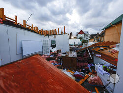 Debris litters a local business that was destroyed by a tornado that passed through downtown Selma Ala., Thursday, Jan. 12, 2023. (AP Photo/Butch Dill)