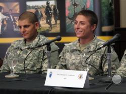 U.S. Army Army 1st Lt. Shaye Haver, right, speaks with reporters, Thursday, Aug. 20, 2015, at Fort Benning, Ga., where she was scheduled to graduate Friday from the Army’s elite Ranger School. (AP Photo/Russ Bynum)