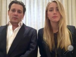 In this image made from video released by the Australian Government Department of Agriculture and Water Resources on Monday, April 18, 2016, actor Johnny Depp and his wife, Amber Heard speak in a videotaped apology played during Monday's hearing at the Southport Magistrates Court on Queensland state's Gold Coast.