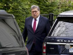 Attorney General William Barr leaves his home in McLean, Va., on Monday, April 15, 2019. Barr told Congress last week he expects to release his redacted version of special counsel Robert Mueller's Trump-Russia investigation report "within a week." (AP Photo/Jose Luis Magana)