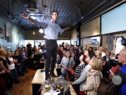 Former Texas congressman Beto O'Rourke speaks to local residents during a meet and greet at the Beancounter Coffeehouse & Drinkery, Thursday, March 14, 2019, in Burlington, Iowa. O'Rourke announced Thursday that he'll seek the 2020 Democratic presidential nomination. (AP Photo/Charlie Neibergall)