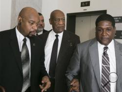 Actor and comedian Bill Cosby leaves after a court appearance Wednesday, Feb. 3, 2016, in Norristown, Pa. Common Pleas Judge Steven O'Neill refused to throw out the sexual assault case against Cosby on Wednesday, sweeping aside a former district attorney's claim that he granted the comedian immunity from prosecution a decade ago. (Ed Hille/The Philadelphia Inquirer via AP, Pool)