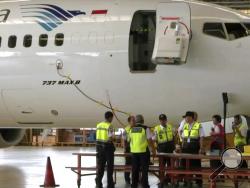 In this image from video taken on Tuesday, March 12, 2019, a Boeing 737 Max 8 aircraft is in hangar before the inspection at Garuda Maintenance Facility at Soekarno Hatta airport, Jakarta. The Indonesian Transport Ministry on Tuesday, March 13, conducted inspections of 737 Max 8 aircraft owned by Garuda Indonesia and Lion Air. (AP Photo)