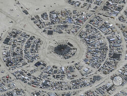In this satellite photo provided by Maxar Technologies, an overview of Burning Man festival in Black Rock, Nev on Monday, Aug. 28, 2023. (©2023 Maxar Technologies via AP)