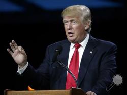  In this July 1, 2016, file photo, Republican presidential candidate Donald Trump speaks during the opening session of the Western Conservative Summit in Denver. Trump is again praising former Iraqi President Saddam Hussein's ruthlessness, saying he killed terrorists "so good." Trump was speaking at a rally Tuesday, July 5, 2016, in North Carolina when he turned to the former Iraqi leader. (AP Photo/David Zalubowski, File)