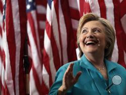 Democratic presidential candidate Hillary Clinton looks up to audience members as she leaves a campaign event at Truckee Meadows Community College in Reno, Nev., Thursday, Aug. 25, 2016. (AP Photo/Carolyn Kaster)