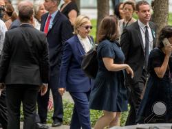 Democratic presidential candidate Hillary Clinton arrives to attend a ceremony at the National September 11 Memorial, in New York, Sunday, Sept. 11, 2016, on the 15th anniversary of the Sept. 11 attacks. (AP Photo/Andrew Harnik)