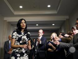 In this Oct., 16, 2015 file photo, Huma Abedin, a longtime aide to Hillary Rodham Clinton, speaks to the media after testifying at a closed-door hearing of the House Benghazi Committee, on Capitol Hill in Washington. The longtime Hillary Clinton aide at the center of a renewed FBI email investigation testified under oath four months ago she never deleted old emails, despite promising in 2013 not to take sensitive files when she left the State Department. (AP Photo/Alex Brandon, File)