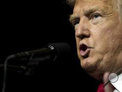 Republican presidential candidate Donald Trump speaks during a campaign rally at the South Florida Fairgrounds and Convention Center, Thursday, Oct. 13, 2016, in West Palm Beach, Fla. (AP Photo/ Evan Vucci)