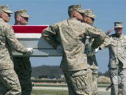 arine Corps Lt. Gen. James Laster, director, Marine Corps Staff salutes at right as a Marine Corps carry team moves a transfer case containing the remains of Marine Corp Staff Sgt. Louis Cardin, of Temecula, Calif., Monday, March 21, 2016, at Dover Air Force Base, Del.. According to the Defense Department, Cardin died March 19, 2016, in support of Operation Inherent Resolve in northern Iraq, from wounds suffered when the enemy attacked his unit with rocket fire. (AP Photo/Cliff Owen)