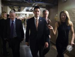 Rep. Paul Ryan, R-Wis., center, and Rep. Trey Gowdy, R-S.C., arrive for a House GOP meeting on Capitol Hill in Washington, Friday, Oct. 9, 2015. The pressure is on Ryan to run for House speaker in the chaotic aftermath of Majority Leader Kevin McCarthy's sudden decision to abandon his campaign for the post. (Doug Mills/ The New York Times via AP)