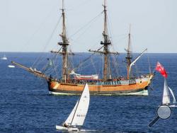 In this April 17, 2005, file photo, the replica of the ship, the Endeavour, lies at anchor after it was removed from a sandbar in Botany Bay, Sydney. Researchers are set to announce on Wednesday, May 4, 2016 that they believe the original Endeavour is submerged somewhere in Rhode Island’s Newport Harbor. (AP Photo/Mark Baker, File)