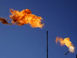 FILE - Flares burn off methane and other hydrocarbons at an oil and gas facility in Lenorah, Texas, Oct. 15, 2021. The U.N. Environment Programme said Friday, Nov. 11, that the new Methane Alert and Response System — MARS for short — is intended to help companies act on major emissions sources but also provide data in a transparent and independent way. (AP Photo/David Goldman, File)