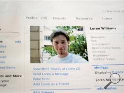 This Feb. 16, 2013 file photo shows a printout of the Facebook page for Loren Williams, now deceased, at the Beaverton, Ore. home of his mother, Karen Williams. Williams sued Facebook for access to Loren's account after he died in a 2005 motorcycle accident at the age of 22. The Uniform Law Commission on Wednesday, July 16, 2014 was expected to endorse a plan to automatically give loved ones access to — but not control of — all digital accounts, unless otherwise specified. (AP Photo/Lauren Gambino, File)