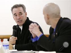 Joe Morrissey and Matt Walton appear during the Richmond Crusade for Voters, Inc. 74th District forum at Hobson Lodge in Richmond, Va. Morrissey resigned his seat under fire late last year after pleading guilty to a misdemeanor charge involving a sex scandal with an under-aged girl working at his law office. (AP Photo/Richmond Times-Dispatch, Mark Gormus)