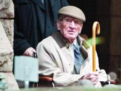 William Welsh, 90, of Homestead enters the courtyard at the Allegheny County Courthouse Friday, April 11, 2014. Welsh, a funeral home director is accused of fatally shooting his embalmer during an argument.