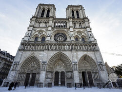 The facade of Notre-Dame de Paris cathedral in Paris, is seen Friday Nov. 29, 2024, ahead of French President Emmanuel Macron's final visit to the construction site to see the restored interiors. (Stephane de Sakutin, Pool via AP)