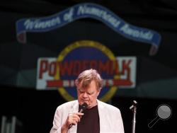 In this June 24, 2016, file photo, "A Prairie Home Companion" host Garrison Keillor rehearses with the band at Tanglewood in Lenox, Mass. Some 18,000 fans at the Hollywood Bowl will be transported to Lake Wobegon, Minn., Friday night, July 1, as writer and humorist Keillor hosts his final episode of the old-style variety show “A Prairie Home Companion” after 42 years on public radio. (Stephanie Zollshan/The Berkshire Eagle via AP)