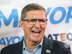 FILE - Michael Flynn, former national security adviser to former President Donald Trump, speaks to attendees as he endorses New York City mayoral candidate Fernando Mateo during a campaign event on June 3, 2021, in Staten Island, N.Y. The Georgia prosecutor investigating whether then-President Donald Trump and others illegally tried to interfere in the 2020 election filed paperwork Friday, Oct. 7, seeking to compel testimony from a new batch of Trump allies, including former U.S. House Speaker Newt Gingrich