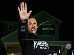 Richard Fierro gestures while speaking during a news conference outside his home about his efforts to subdue the gunman in Saturday's shooting at Club Q, Monday, Nov. 21, 2022, in Colorado Springs, Colo. (AP Photo/Jack Dempsey)