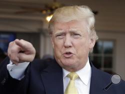 In this July 6, 2015, file photo, Republican presidential candidate Donald Trump arrives to a fundraising event at a golf course in the Bronx borough of New York. (AP Photo/Seth Wenig, File)