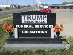 This April 7, 2016 photo provided by Trump Memorials & Funeral Services shows a granite sign outside the company's Lincoln, Neb., building near its parking lot. The business was established in 1921 and with the exception of a name, it has no connection to presidential candidate Donald Trump. (Darcy J. Hansen/Trump Memorials & Funeral Services via AP)