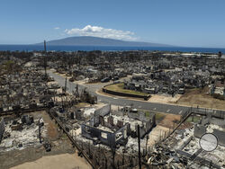 A general view shows the aftermath of a devastating wildfire in Lahaina, Hawaii, Tuesday, Aug. 22, 2023. Two weeks after the deadliest U.S. wildfire in more than a century swept through the Maui community of Lahaina, authorities say anywhere between 500 and 1,000 people remain unaccounted for. (AP Photo/Jae C. Hong)