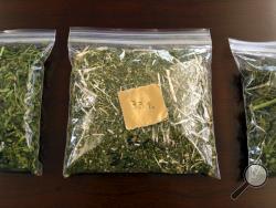 Samples of hemp sit on a table in the conference room at Andrew Ross' office in Denver on Friday, March 22, 2019. Ross, a Marine who served in Afghanistan and Iraq, is facing 18 years to life in Oklahoma if he is convicted after he was arrested in January while providing security for a load of state-certified hemp from Kentucky. Federal legalization for hemp has created a quandary for police as authorities lack the technology to distinguish marijuana from agricultural hemp at a roadside stop. (AP Photo/Thom