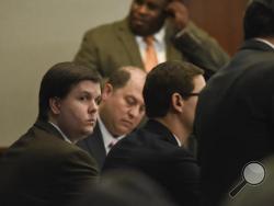 Justin Ross Harris sits with his defense team in the Glynn County Courthouse in Brunswick, Ga., Monday, Nov. 14, 2016. Harris, a Georgia man whose toddler son died after being left for hours in a hot car, was convicted of murder Monday by a jury that concluded a month's worth of trial testimony and evidence showed the father left his child to perish on purpose. (John Carrington/Atlanta Journal-Constitution via AP)