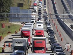 Traffic stacks up on I-75 North fleeing the coast and Hurricane Matthew on Thursday, Oct. 6, 2016, near McDonough, Ga. Hurricane Matthew steamed toward heavily populated Florida with terrifying winds of 140 mph Thursday, and 2 million people across the Southeast were warned to flee inland. (Curtis Compton/Atlanta Journal-Constitution via AP)