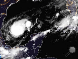 This satellite image from the National Oceanic and Atmospheric Administration taken at 11:36pm ET on Sunday, Oct. 6, 2024, shows Hurricane Milton. (NOAA via AP)