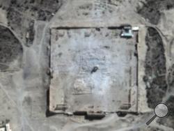 This Monday, Aug. 31, 2015 satellite image provided by UNITAR-UNOSAT shows damage to the main building of the ancient Temple of Bel in the Palmyra, Syria. The main building has been destroyed, a United Nations agency said. The image was taken a day after a massive explosion was set off near the 2,000-year-old temple in the city occupied by Islamic State militants. (UrtheCast, UNITAR-UNOSAT via AP)