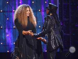 Janelle Monae, right, presents a trophy to inductee Janet Jackson at the Rock & Roll Hall of Fame induction ceremony at the Barclays Center on Friday, March 29, 2019, in New York. (Photo by Evan Agostini/Invision/AP)