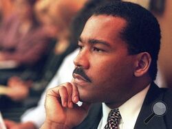 FILE - Dexter King, son of the late civil rights leader Martin Luther King Jr., listens to arguments in the State Court of Criminal Appeals in Jackson, Tenn., Friday, Aug. 29, 1997, to determine whether two Memphis judges have overstepped their authority surrounding the investigation of the King assassination. The King Center in Atlanta said the 62-year-old son of the civil rights leader died Monday, Jan. 22, 2024 at his California home after battling prostate cancer. (Helen Comer/The Jackson Sun via AP, Po