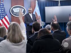 Defense Secretary Lloyd Austin takes question from reporter during a Pentagon press briefing at the Pentagon on Thursday, Feb. 1, 2024 in Washington. (AP Photo/Kevin Wolf)
