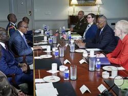 Kenya's Defense Minister Aden Duale, center left, speaks during a meeting with Defense Secretary Lloyd Austin, center right, at the Pentagon in Washington, Wednesday, Feb. 7, 2024. (AP Photo/Susan Walsh)