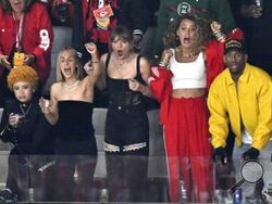 Ice Spice, from left, Ashley Avignone, Taylor Swift and Blake Lively react during the first half of the NFL Super Bowl 58 football game between the San Francisco 49ers and the Kansas City Chiefs on Sunday, Feb. 11, 2024, in Las Vegas. (AP Photo/David Becker)
