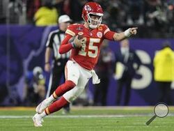 Kansas City Chiefs quarterback Patrick Mahomes (15) runs against the San Francisco 49ers during the second half of the NFL Super Bowl 58 football game Sunday, Feb. 11, 2024, in Las Vegas. (AP Photo/George Walker IV)