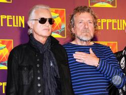 In this Oct. 9, 2012 file photo, Led Zeppelin guitarist Jimmy Page, left, and singer Robert Plant appear at a press conference ahead of the worldwide theatrical release of "Celebration Day," a concert film of their 2007 London O2 arena reunion show, in New York. 