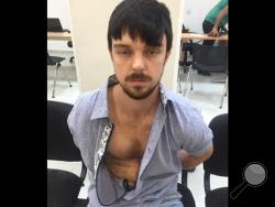 This Dec. 28, 2015 photo released by Mexico's Jalisco state prosecutor's office shows who authorities identify as Ethan Couch, after he was taken into custody in Puerto Vallarta, Mexico. U.S. authorities said the Texas teenager serving probation for killing four people in a drunken-driving wreck after invoking an "affluenza" defense, was in custody in Mexico, weeks after he and his mother disappeared. (Mexico's Jalisco state prosecutor's office via AP)